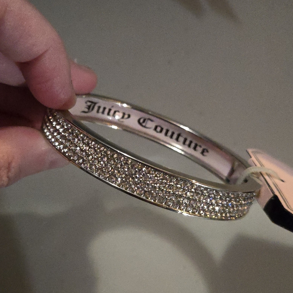 Juicy Couture Silver Tone Bangle with Pink Interior Trim